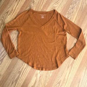 Brown American eagle long sleeved shirt.